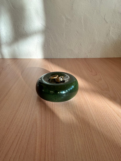 Round handmade ceramic catch-all dish with deep bottle green glaze