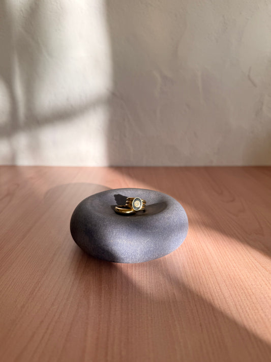 Round handmade ceramic catch-all dish with glossy plum grey glaze
