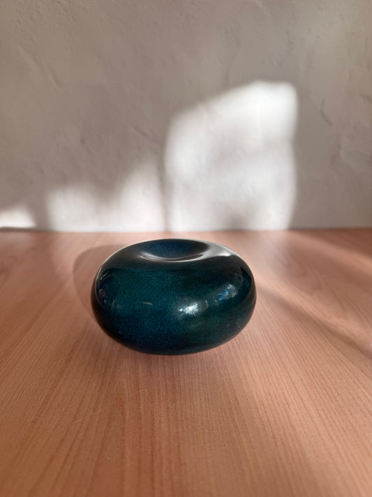 Round handmade ceramic catch-all dish with glossy teal glaze