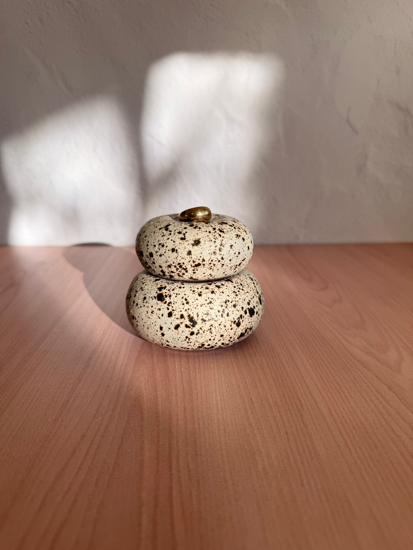 Small handmade ceramic catch-all dish with speckled cream glaze