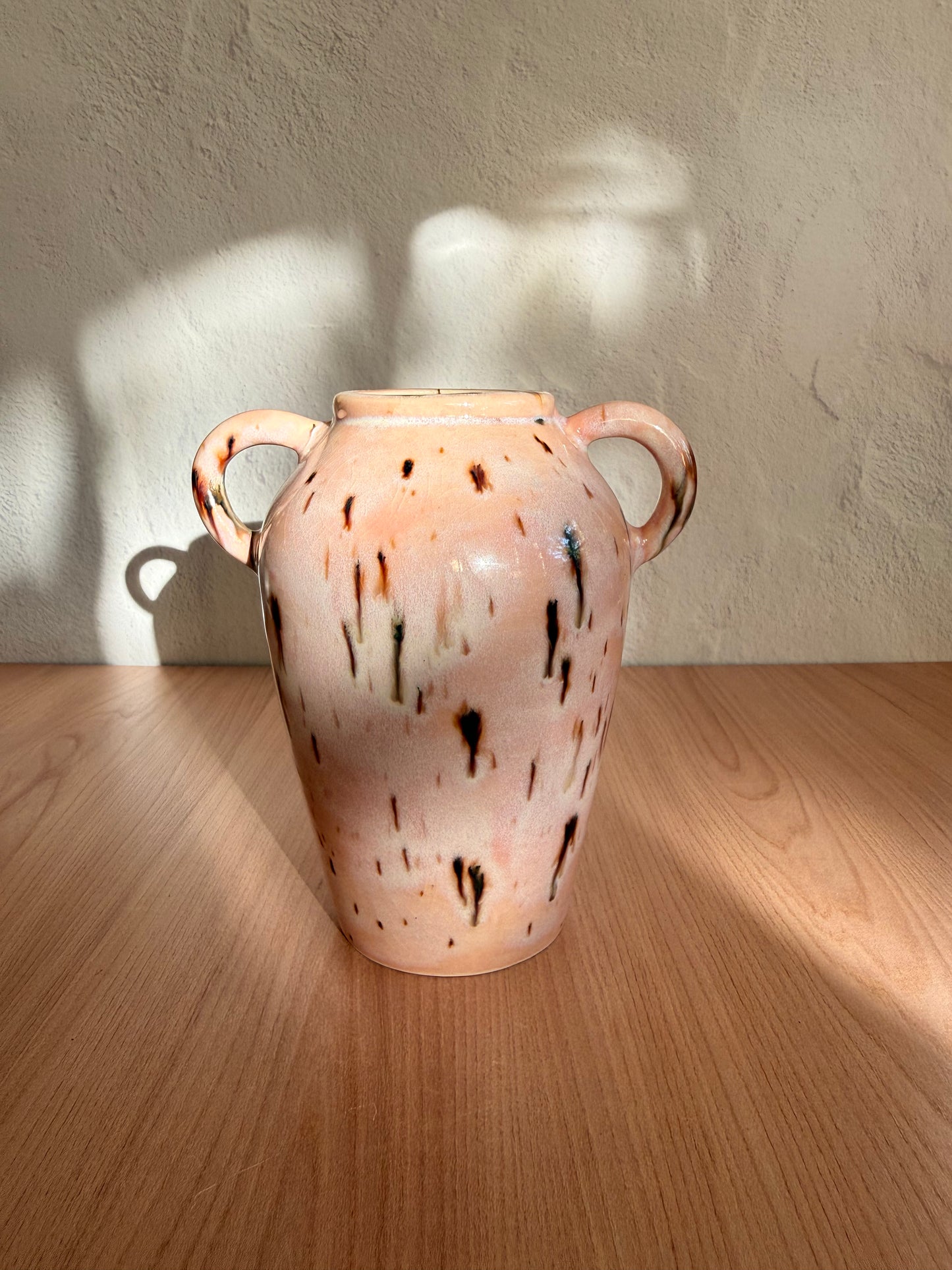 Small handmade ceramic bulb vase with bronze metallic glaze